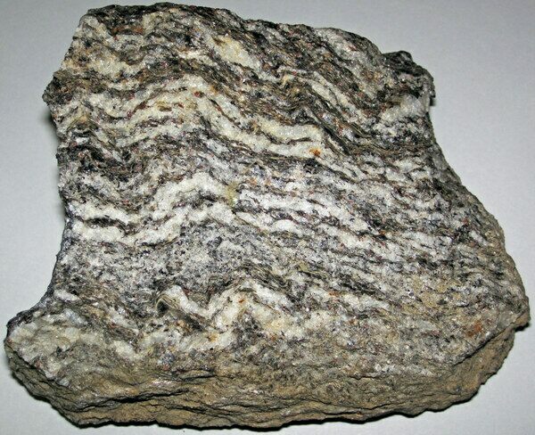 Metamorphic rock known as "granite gneiss". Formed from metamorphosed granite.